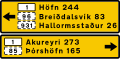 Destination ahead (b) with distances in capital area