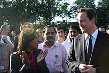 Woman talking to prime minister