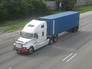 A truck transporting an intermodal container on Interstate 95 in South Florida