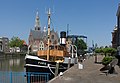 Maassluis, tugboat (de Furie) with church (de Groote Kerk)