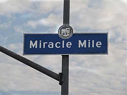 Miracle Mile Neighborhood sign located at the intersection of San Vicente Boulevard & Hauser Boulevard