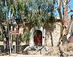 This oblong stone building that was erected in 1877 was the first Ned. Geref. Church building in Springbok. It was restored in 1899 and served increasingly as a church building until 1921. The adjacent Jewish Synagogue was erected by M. Klawansky in 1929. Type of site: Synagogue, Church. This oblong stone building that was erected in 1877 was the first Ned. Geref. Church building in Springbok. It was restored in 1899 and served increasingly as a church building until 1921. The adjacent Jewish Synagogue was erected by M. Klawansky in 1929.