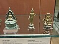 Seated Buddha, Padmapani and female bodhisattva