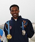 Shani Davis with Olympic Medals
