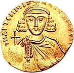 Obverse and reverse of gold coin, with a bearded crowned man holding a globus cruciger and a cross on four steps