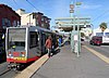 A southbound train at Oakdale/Palou station, 2018