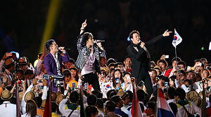 JYJ at the 2014 Asian Games opening ceremony. From left to right: Kim Junsu, Kim Jae-joong, and Park Yoo-chun (former).