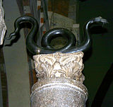 Bronze snake (formerly believed to be the one by Moses), nave of Sant'Ambrogio basilica in Milan, Italy