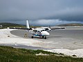 Image 8Barra Airport (Scottish Gaelic: Port-adhair Bharraigh) (IATA: BRR, ICAO: EGPR) (also known as Barra Eoligarry Airport) is a short-runway airport (or STOLport) situated in the wide shallow bay of Traigh Mhòr at the north tip of the island of Barra in the Outer Hebrides, Scotland. The airport is unique, being the only one in the world where scheduled flights use a beach as the runway.