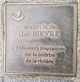 Plaque située au niveau des n°12-14.