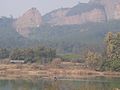 view of rock from riverbank