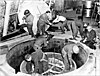 British and American members of the Alsos Mission dismantle the experimental nuclear reactor that German scientists had built as part of the German nuclear energy project in Haigerloch.