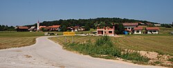 View of Gorenje Jesenice from the east standing on the main local road