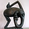 This asymmetrical carving by a Makonde artist represents an elephant shetani
