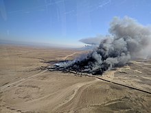 Oil fires burn near Qayyarah, Iraq