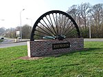 Colliery wheel welcome village sign for Rhiwabon (Ruabon)