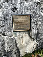 Plaque at the base of the lower range light for The Ridges Sanctuary.