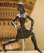 Bronze figure of a running woman from Sparta. The baring of one breast was a sign that a woman was engaging in athletics or warfare. British Museum, 520–500 BC.
