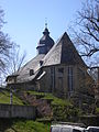 Evangelische Pfarrkirche St. Salvator mit Ausstattung, Glockenhaus mit Glocken, Kirchhof mit Grabsteinen, Einfriedung, Stützmauern und Treppenanlage