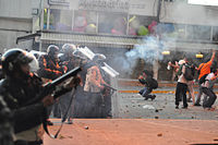 Tear gas being used against opposition protesters during the 2014 Venezuelan protests