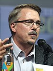 Vince Gilligan speaking into a microphone at San Diego Comic-Con