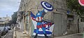 Mural depicting Joe Biden as Captain America, protecting Israel.