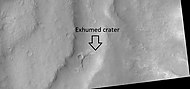 Exhumed crater, as seen by HiRISE under HiWish program. After its formation, the crater was buried, now it is being exposed by erosion.