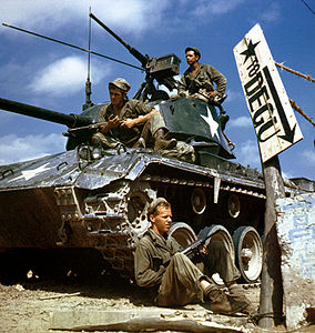 Crew of an M-24 Chaffee Tank at Korean War, by Sgt. Riley