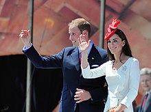 Catherine and William waving to the crowds behind the camera
