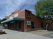 Different view of Jim Ong's Market built in 1928 and located at 1110 E. Washington St. The structure, one of two built by the owner in the Chinese Community, also served as the home of the Ong family. Listed in the National Register of Historic Places. Reference number 82002084 (NRHP).