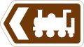 Direction to tourist attraction indicated by a symbol