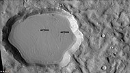 Unnamed crater north of Cerulli, as seen by CTX camera. Floor is covered in "brain terrain." Arrows point to ring mold craters. Note: this is an enlargement of previous image.