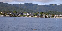 A row of backyard boat docks along Del Oro Lagoon in Bel Marin Keys