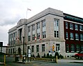The Canada Revenue Agency offices at 130 South Syndicate Avenue, across from the Victoriaville parkade. Designed by T. W. Fuller and built in 1935 this building served as Fort Williams second post office.[43]