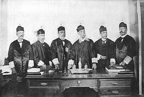 Six men with round hats