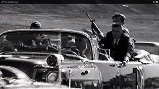 Secret Service agent George W. Hickey with an ArmaLite AR-15 Model 01 moments after President Kennedy was shot in Dallas on November 22, 1963