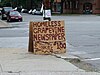 A sign advertising the Homeless Grapevine