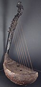 Harp of the Mangbetu people, snakeskin soundboard.