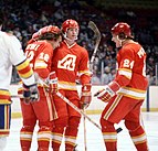 Members of the Calgary Flames celebrating in a 1978 game