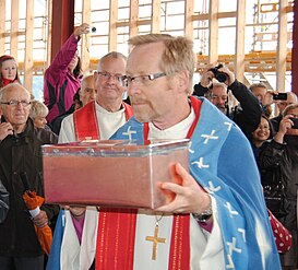 Bishop with foundation stone