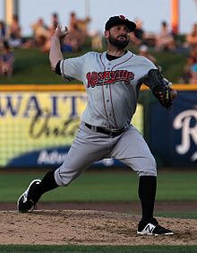 A baseball player in gray