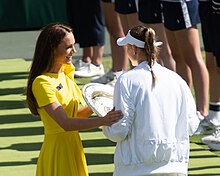 Catherine congratulating a female tennis player