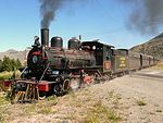 La Trochita heritage railway train crosses Argentine national route 259 in January 2010