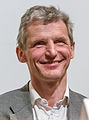 Wolfgang Ketterle (1957-) Awarded the Nobel Prize in Physics in 2001, jointly with Eric A. Cornell and Carl E. Wieman for the achievement of Bose-Einstein condensation, predicted in 1924 by Satyendra Nath Bose and Albert Einstein, in dilute gases of alkali atoms, and for early fundamental studies of the properties of the condensates.