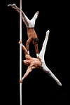 Cuban acrobatic artists Leosvel and Diosmani on the Chinese pole