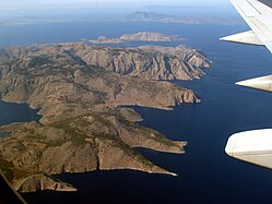 Symi island seen from above, with Turkey in the background