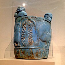 Pyxis made out of "Egyptian blue" faience): Imported to Italy from northern Syria, (750–700 BC}