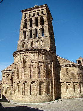 The Church of San Lorenzo in Sahagún, Leon, has the tiered apses and galleried tower of brick churches in the region.