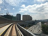 View of the station from the MRT tracks over the Damansara-Puchong Expressway.