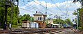 Panoramic view of Bryn Mawr station looking east with 1895 Interlocking Control Tower as Amtrak's daily westbound run of its New York to Pittsburgh Pennsylvanian passes on Track 3.